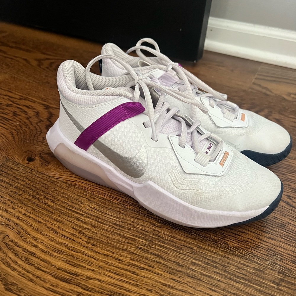 White and purple basketball shoes